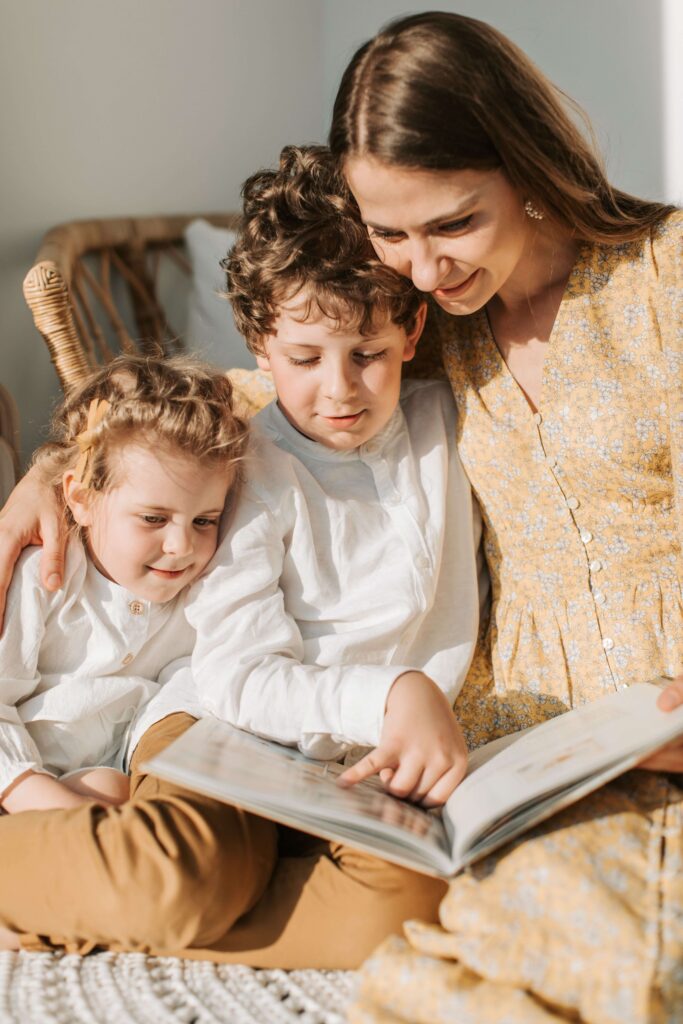 An image of a mother with two children having parenting is fun time.