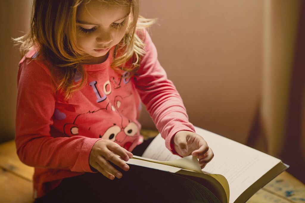 An image of a child writing in journal.