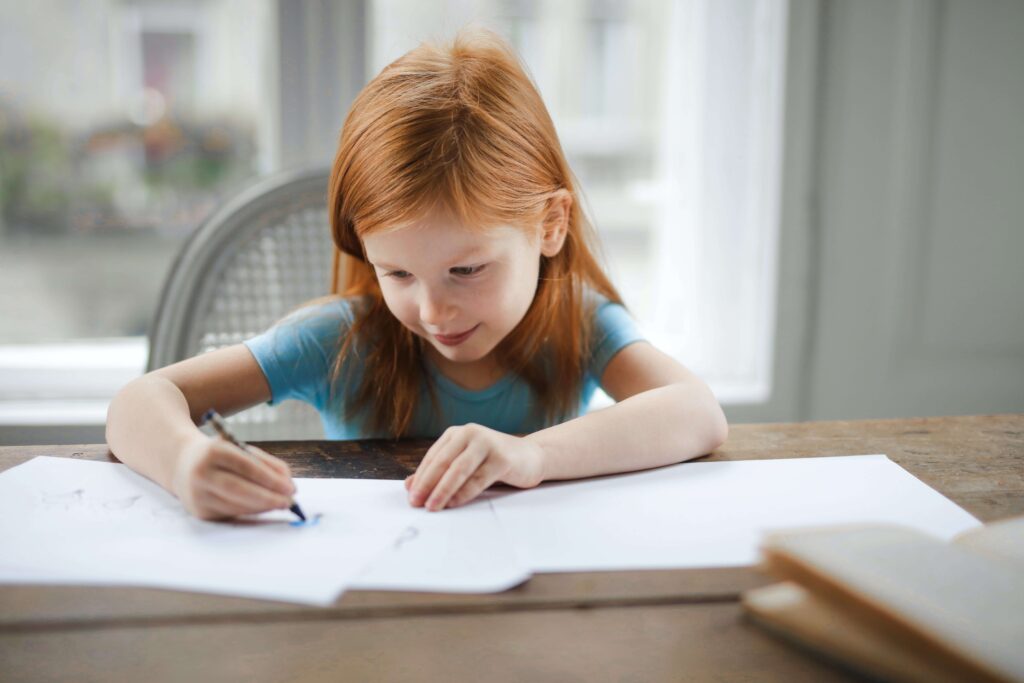 An image of a child focusing on studies.