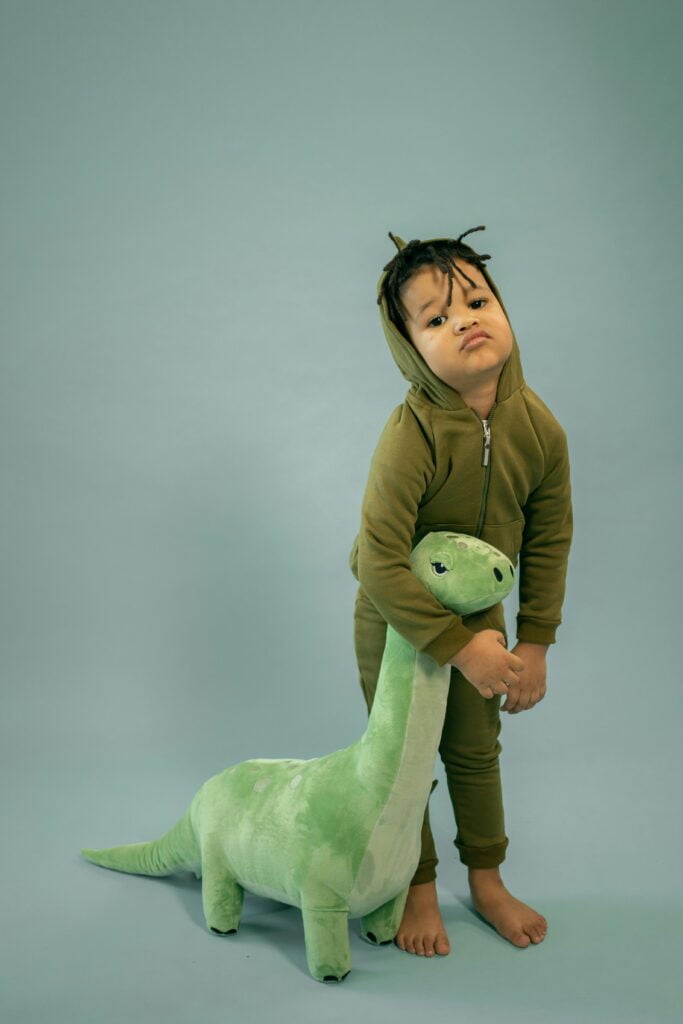 An image featuring a group of children appearing disinterested and restless, showcasing the universal experience of childhood boredom. 