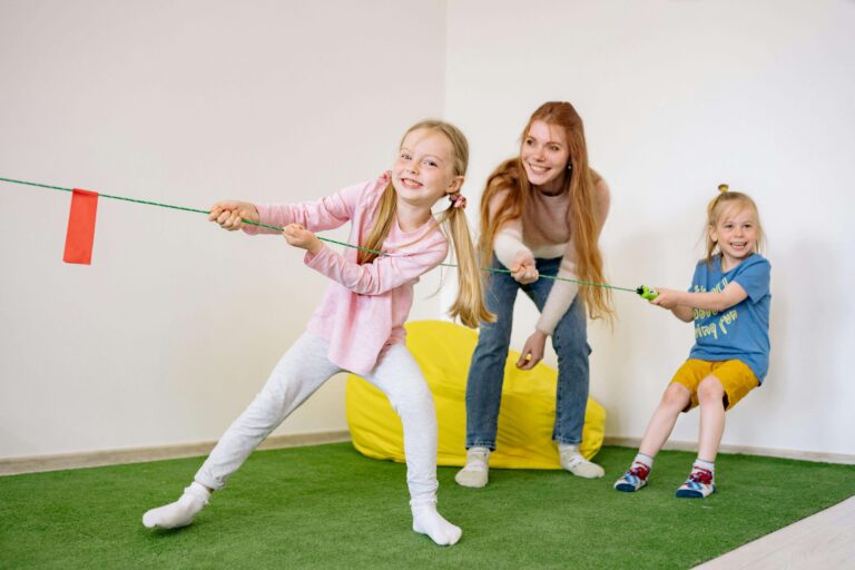 An image of children playing tug of war in party games.