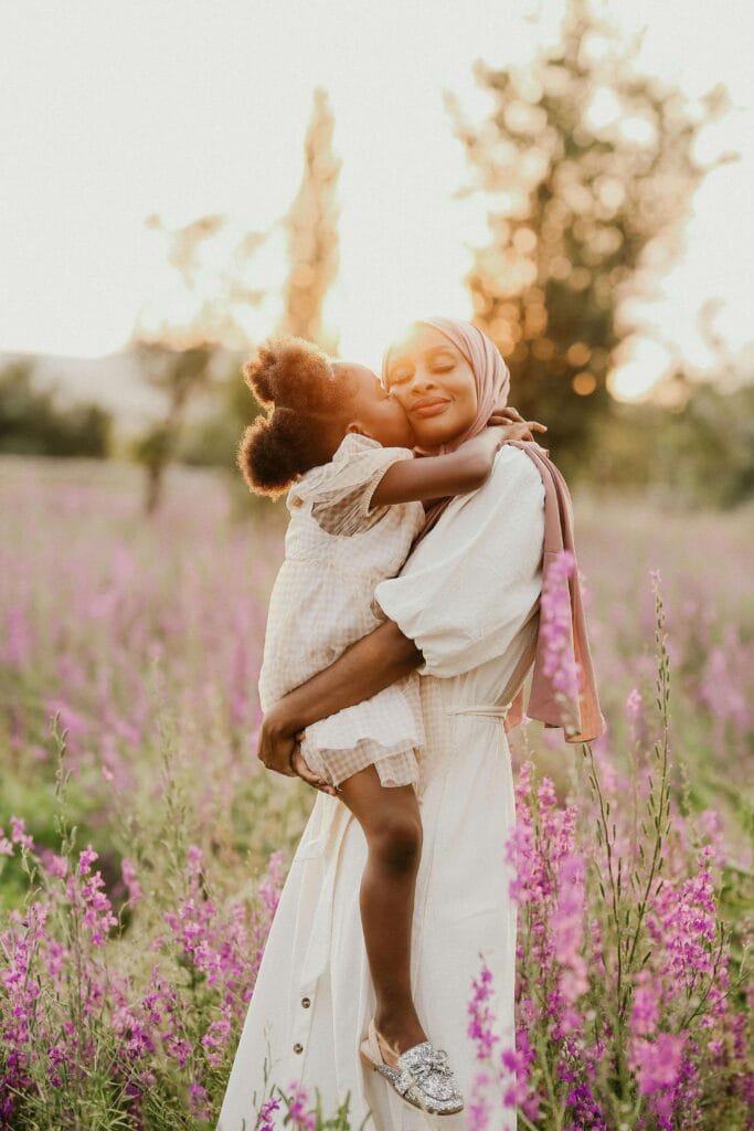 An image of a mother showing  love and patience to her child as it among parenting skills every parent need to know.